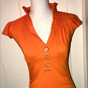 Trixxi Orange Top three buttons
